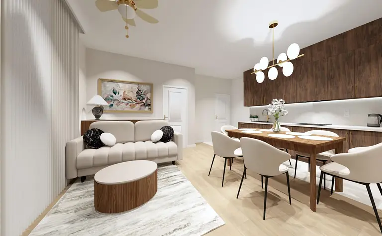 Wnętrze salonu z jasnymi meblami, drewnianym stołem i nowoczesnym oświetleniem.