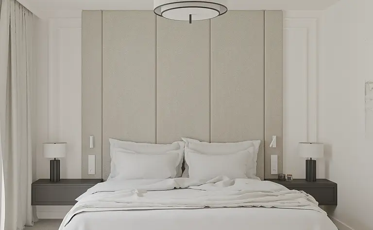 Sypialnia z minimalistycznym designem, jasnymi kolorami i nowoczesnym oświetleniem.