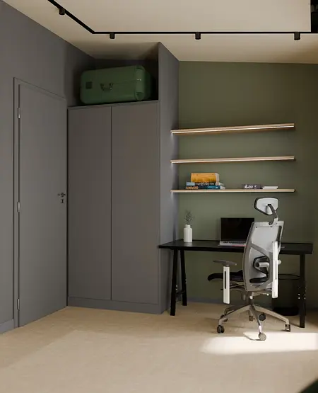Gabinet w stylu soft minimalizmu z zieloną ścianą i szarym biurkiem.