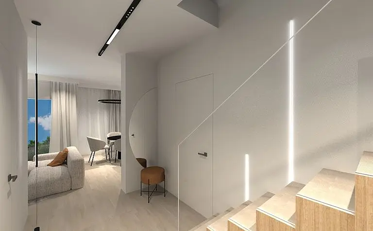 Minimalistyczna łazienka z szarymi płytkami, białą umywalką i drewnianą szafką.