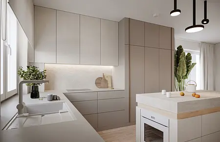 Nowoczesna kuchnia z minimalistycznym designem, beżowe meble i zielone rośliny.