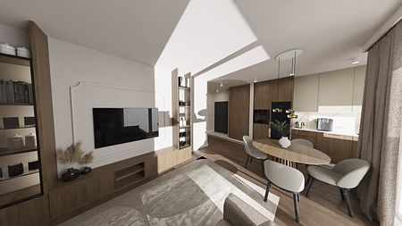 Wnętrze kuchni z drewnianymi meblami, jasną zabudową i nowoczesnym oświetleniem.