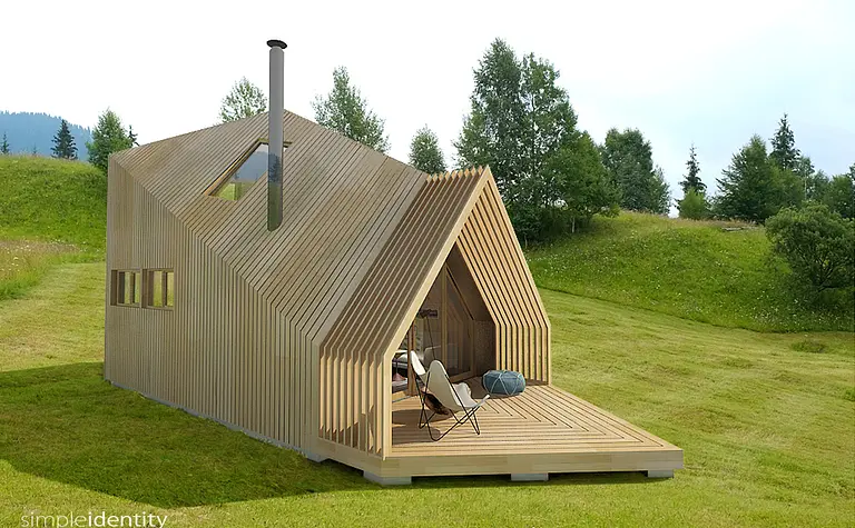 Drewniany domek w stylu japandi i skandynawskim na tle zieleni.