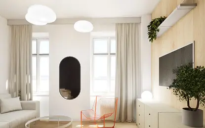 Wnętrze salonu w stylu boho, japandi i minimalistycznym z jasnymi meblami.