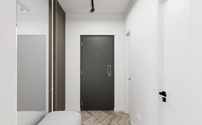 Nowoczesny przedpokój z minimalistycznym siedziskiem i drewnianą podłogą.