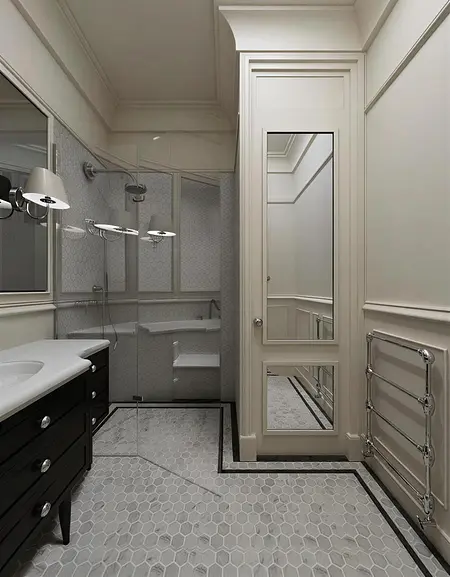 Łazienka w stylu art deco i vintage z czarną szafką i białymi akcentami.
