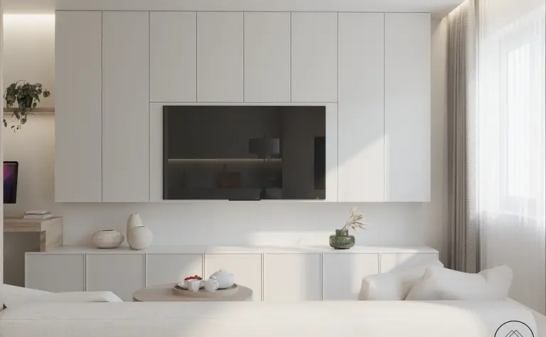 Minimalistyczny salon w stylu skandynawskim z białymi meblami i drewnianymi detalami.