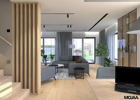 Współczesny salon z szarymi meblami i drewnianą podłogą, rośliny w tle.