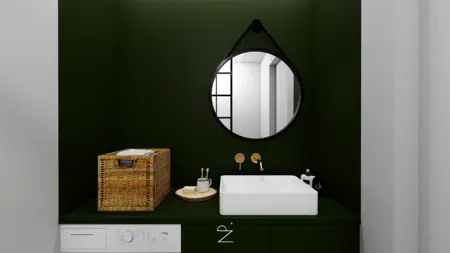 Wnętrze łazienki w stylu industrialnym i minimalistycznym z zielonymi ścianami i białą umywalką.