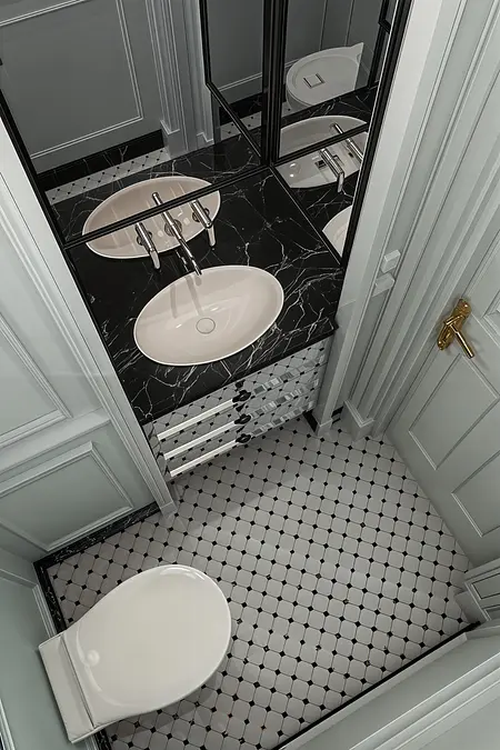 Mała łazienka w stylu art deco i vintage z czarnym blatem i białą umywalką.