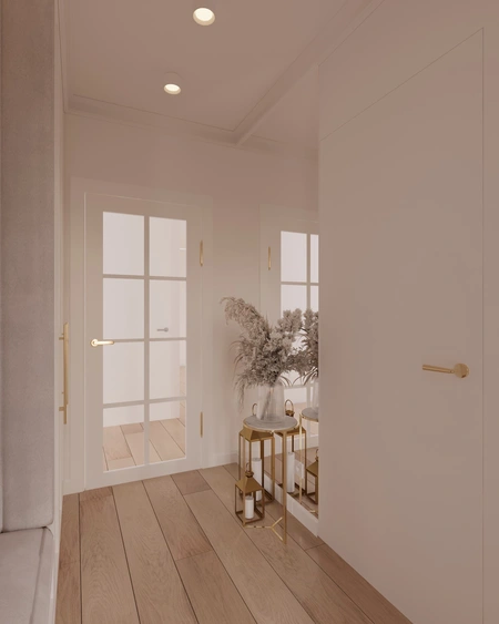 Przedpokój w stylu quiet luxury z białymi ścianami i drewnianą podłogą.