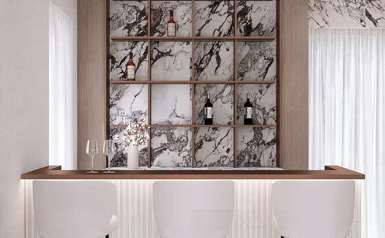Nowoczesny bar w stylu quiet luxury z białymi stołkami i marmurowym tłem.