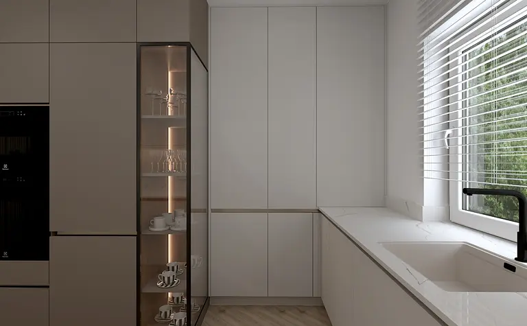 Wnętrze kuchni w stylu minimalistycznym z białymi meblami, czarnym kranem i drewnianą podłogą.