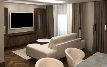 Wnętrze salonu w stylu minimalistycznym z beżową sofą, brązowymi meblami i dużym telewizorem.