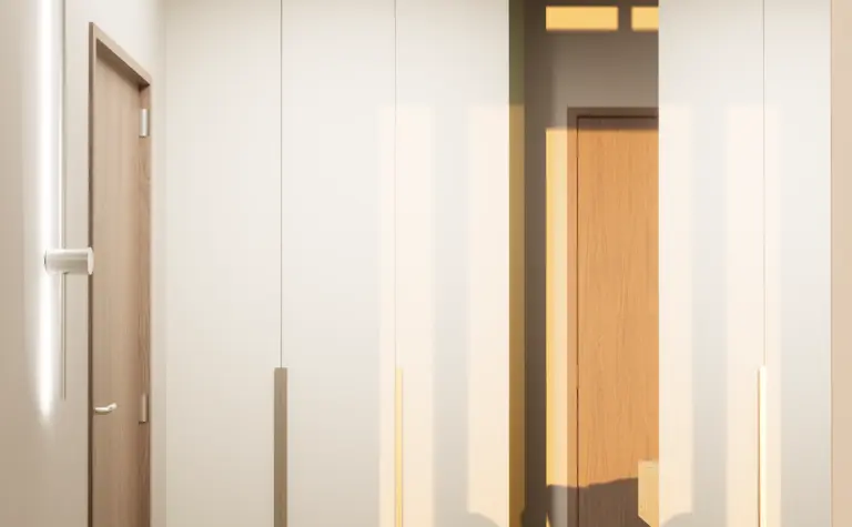 Przedpokój w stylu japandi z białymi meblami i minimalistycznym oświetleniem.