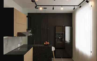 Kuchnia w stylu industrialnym z drewnianymi meblami i minimalistycznym wykończeniem.