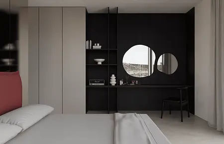 Minimalistyczna sypialnia z szarymi meblami i nowoczesnym lustrem