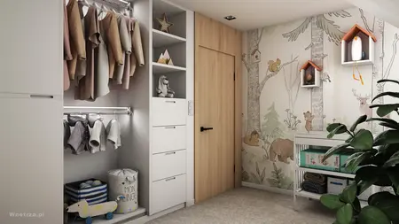 Garderoba z jasnymi meblami, drewnianymi detalami i dekoracyjną tapetą.
