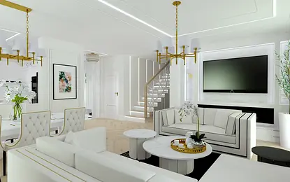 Wnętrze salonu w stylu glamour z białymi meblami i złotymi detalami.