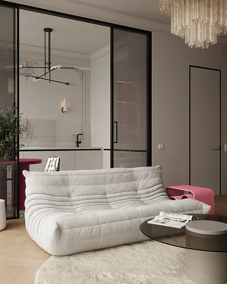 Eklektyczne wnętrze z nowoczesną szaro-białą kuchnią i glamour sofą.