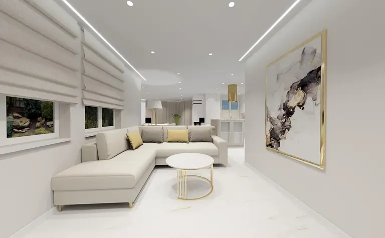 Wnętrze salonu z beżową sofą, nowoczesnymi akcentami glamour i współczesnym wystrojem.