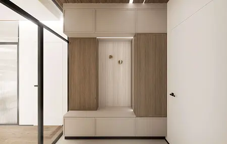 Minimalistyczny przedpokój z drewnianymi szafkami i jasnym tłem, nowoczesny design.