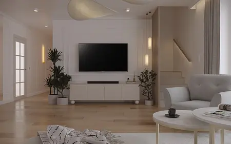 Wnętrze salonu z szarym wypoczynkiem i roślinami, styl quiet luxury.