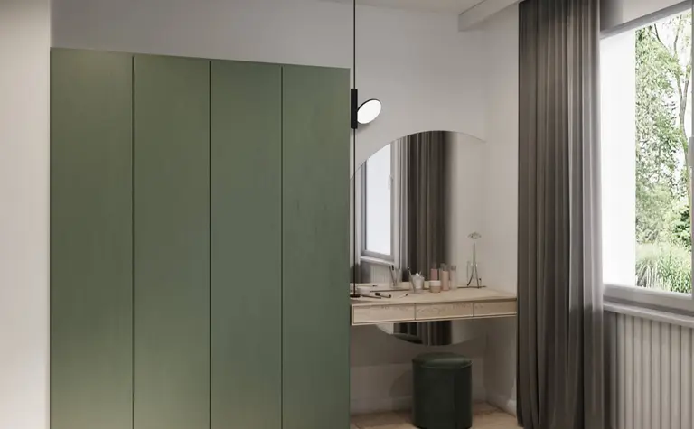 Eklektyczna sypialnia z minimalistycznymi meblami, zieloną szafą i nowoczesnym biurkiem.