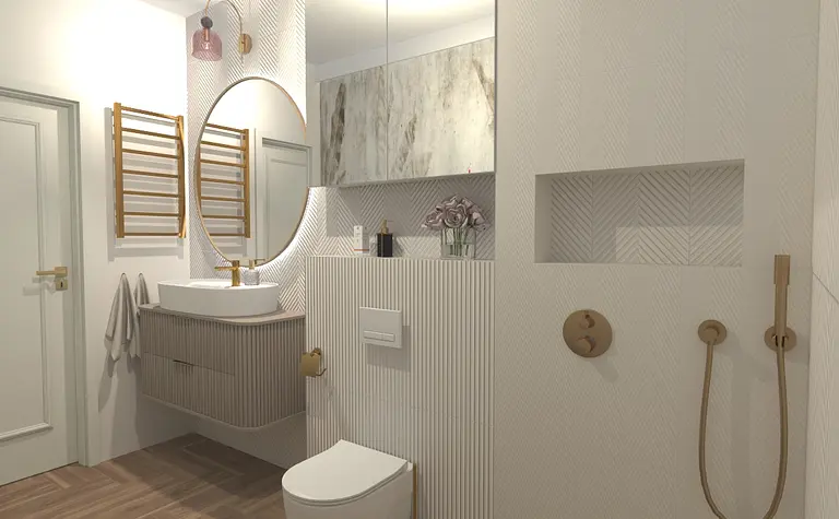 Współczesna łazienka z białymi płytkami, umywalką i złotymi detalami.