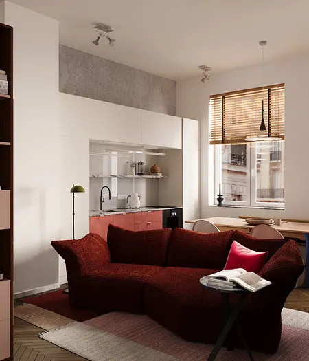 Wnętrze salonu w stylu eklektycznym z czerwonymi akcentami i białą kuchnią