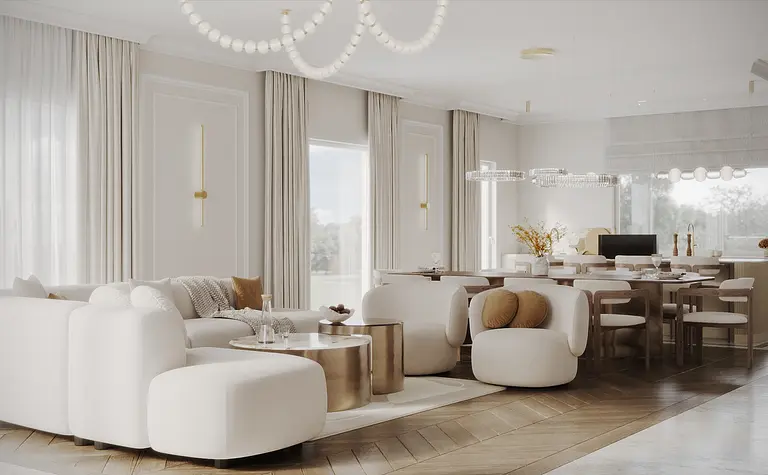 Wnętrze salonu z białymi meblami i elementami quiet luxury.