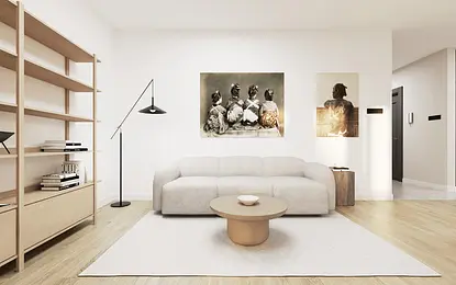 Wnętrze salonu w stylu japandi i minimalistycznym z szarym sofą i drewnianymi detalami.