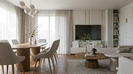 Wnętrze jadalni z okrągłym stołem, szarymi krzesłami i nowoczesnym oświetleniem.