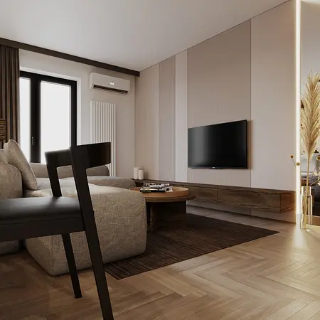 Minimalistyczny salon z szarymi meblami i drewnianym stolikiem.