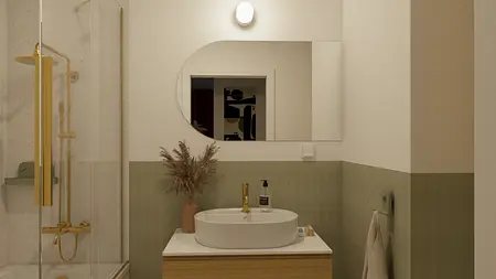 Eklektyczna łazienka z białą umywalką i vintage dodatkami.