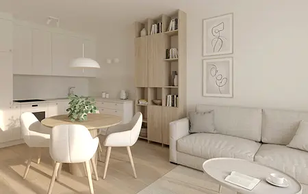 Wnętrze kuchni w stylu soft minimalizm z białymi meblami i drewnianym stołem.