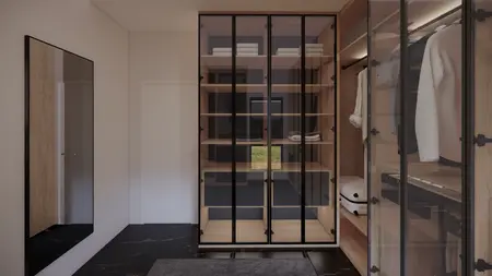 Garderoba z minimalistycznym wystrojem, przeszklone szafki, nowoczesne lusterko.
