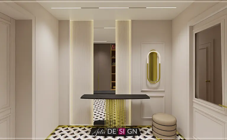 Przedpokój w stylu art deco z czarnym stolikiem i złotymi akcentami.