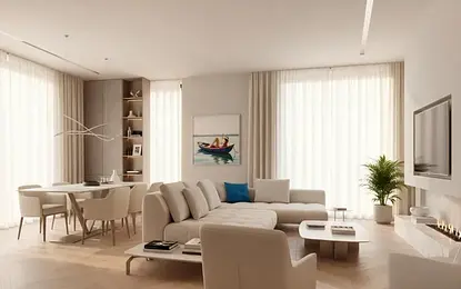 Wnętrze salonu w stylu minimalistycznym z jasnymi meblami i dużymi oknami.