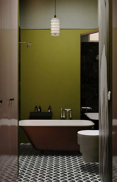 Wnętrze łazienki z wanną, zielonymi ścianami i akcesoriami w stylu eklektycznym i industrialnym.