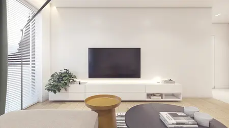 Wnętrze nowoczesnego salonu z białymi ścianami i drewnianą podłogą, skandynawski styl.