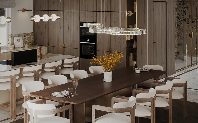 Wnętrze jadalni z drewnianym stołem, białymi krzesłami i delikatnymi akcentami quiet luxury.