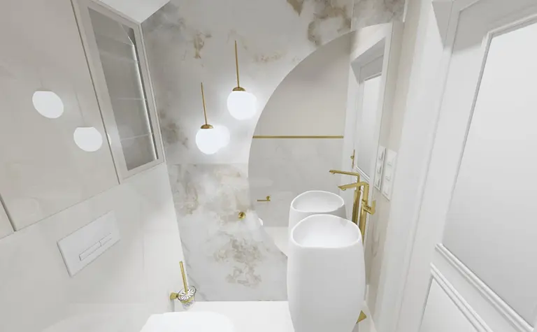 Nowoczesna łazienka z białymi umywalkami, marmurowymi ścianami i złotymi detalami.