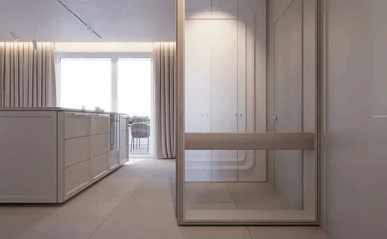 Wnętrze kuchni w stylu japandi z minimalistycznym wykończeniem i drewnianymi detalami.
