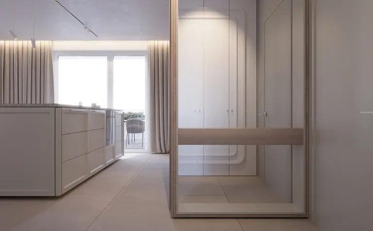 Wnętrze kuchni w stylu japandi z minimalistycznym wykończeniem i drewnianymi detalami.