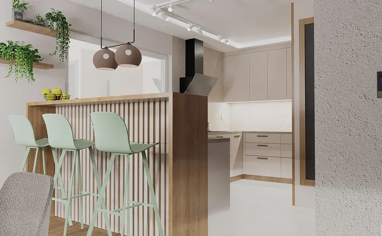 Wnętrze kuchni z drewnianym blatem, zielonymi krzesłami i roślinami.