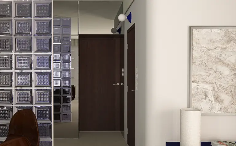 Nowoczesny przedpokój z brązowym fotelem, szafką i szklanym panelem.