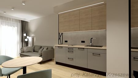 Wnętrze kuchni w stylu industrialnym i minimalistycznym z szarymi meblami i drewnem.