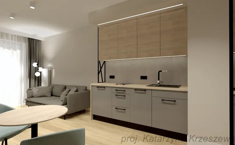 Wnętrze kuchni w stylu industrialnym i minimalistycznym z szarymi meblami i drewnem.
