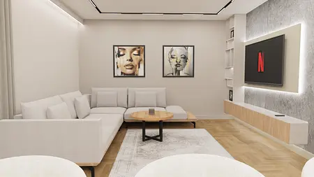 Wnętrze salonu z białą sofą, drewnianym stolikiem i obrazami. Styl industrialny i nowoczesny.